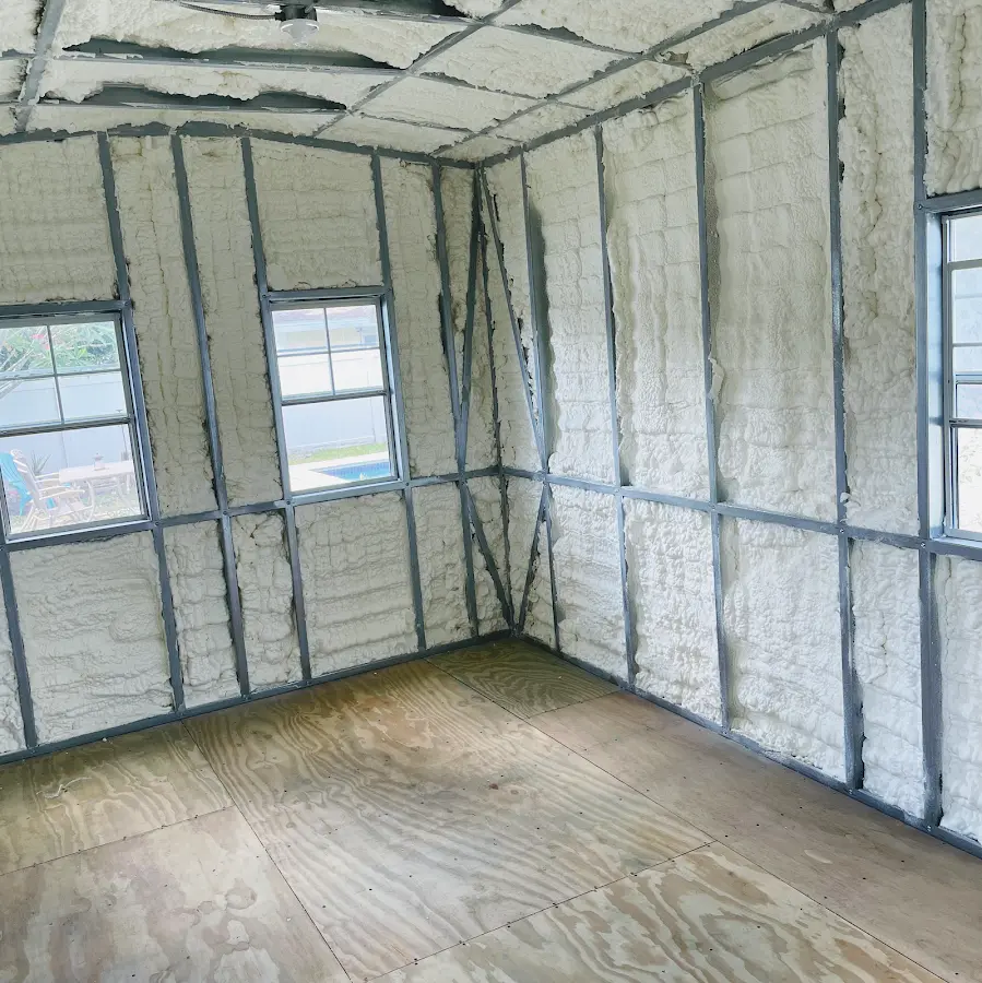 Closed-cell spray foam insulation applied to wall cavities in a residential project in Brier